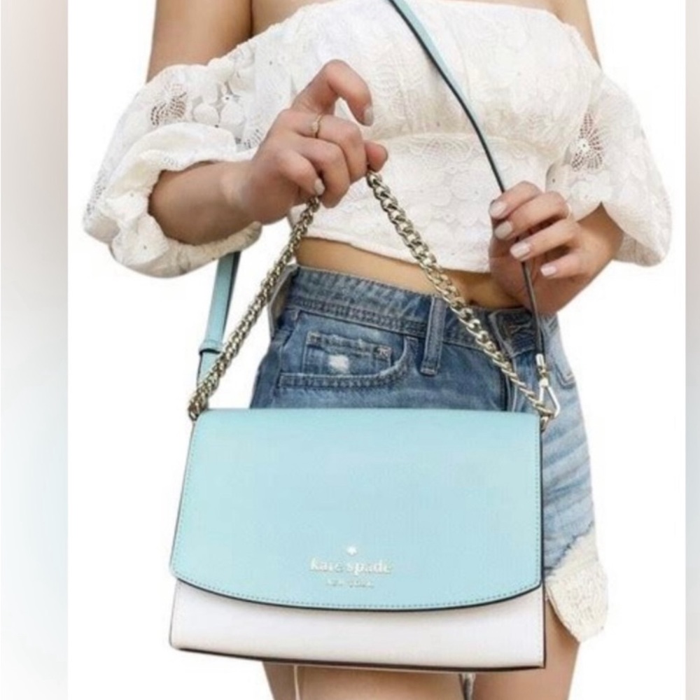 New with tags. Kate spade leather crossbody and mini wallet. Never been used.